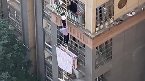 Chinese Have Had Enough Imprisonment - Climbing Down Sides Of Buildings To Get Out