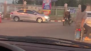 Dog Goes on Scooter Cruise