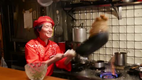 The Chef Performs A Stir-fry Performance