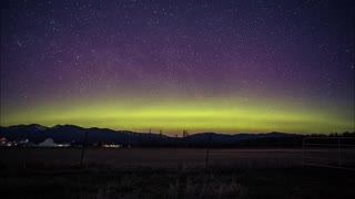 Stunning Aurora Borealis Dances Across Star Filled Sky