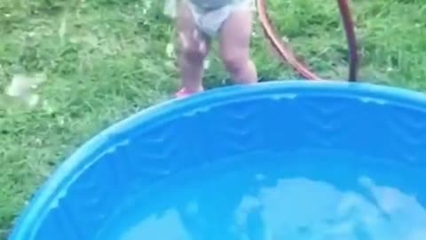 Funny baby playing video