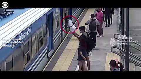 Argentina woman survives fainting and falling through gap of oncoming train