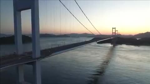 Drone Escape bridge in the sunset - ドローンエスケープ。 夕日の橋