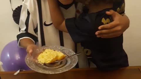 Brother is Thrilled to Receive the First Piece of Cake