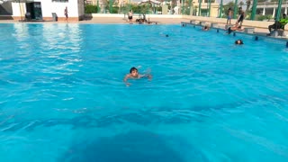 Diver Enjoys Time Snorkeling In Swimming Pool