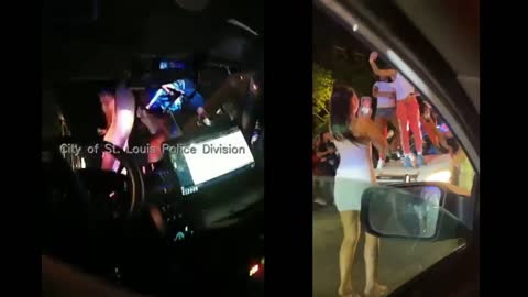 BODYCAM: St. Louis Officer Trapped Inside As Criminal Thugs Host Dance Party On Cruiser's Roof