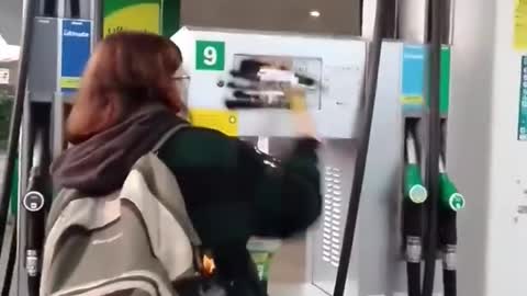 Socialist activists destroying gas station