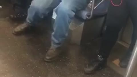 Man talks about life and marriage loudly on the phone on subway train