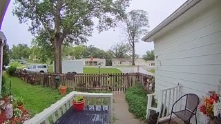 Door cam footage: Truck goes through yard.