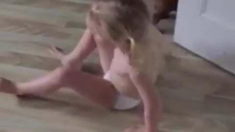 Little girl licks her feet to 'moonwalk' better