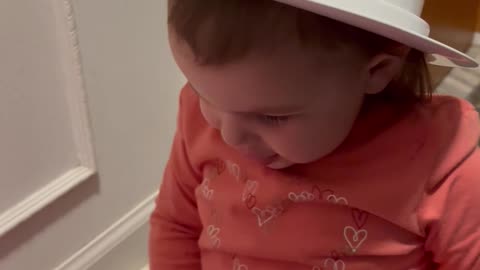 Toddler Has A Very Unique Hat On Her Head