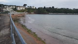 Paignton watching the waves hit the shore