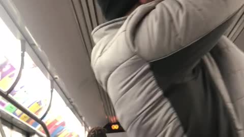 Guy does pull ups on subway train