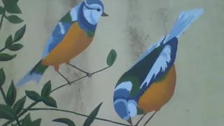 2 pássaros lindos, desenhados sobre um galho de árvore na parede [Nature & Animals]