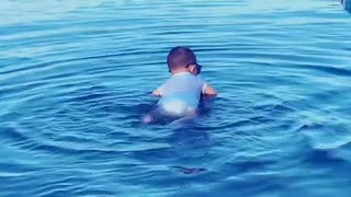 7-month-old already loves to go swimming
