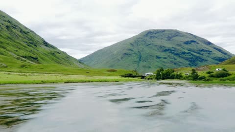 aerial drone shot of Loch Achtriochtan in Glen Coe, Scotland.