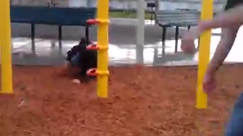 Playground zipline falls on back