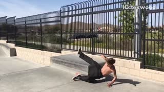 Shirtless skateboarder falls on grind skateboard almost hits head