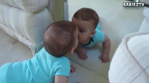 Funny Baby Sees Mirror For The First Time