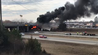 Truck Catches Fire after Colliding with Overpass