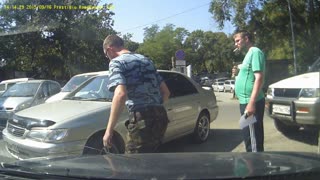 Driver Moves A Car Blocking His Way