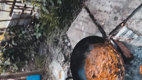 Boys making meat for the party