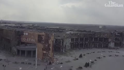 Drone video shows destroyed residential buildings and shopping centre in Ukraine