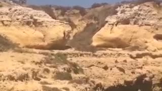 Guy jumping into water lands on boat