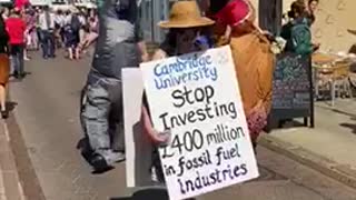 Dinosaurs protest on the streets of Cambridge