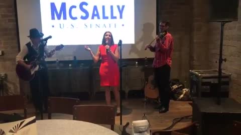Rep. Martha McSally sings “God Bless America” at victory party