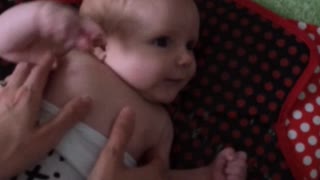 10 week old baby attempts to laugh for the first time