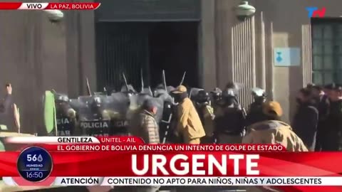 Bolivia Coup — A tank breaks the door of the Palacio Quemado