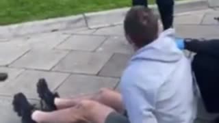 Australian Man Handcuffed for the Crime of Eating Maskless Outside