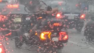 Biker In The Rain