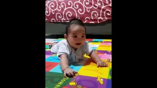 Happy baby's laughter is extremely contagious
