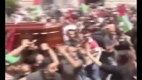 Violent clashes at funeral of Al Jazeera journalist killed, Israeli police shove mourners
