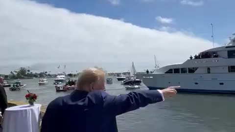 Trump, wearing a gold tie, greets Trump supporters in Newport Beach, California!