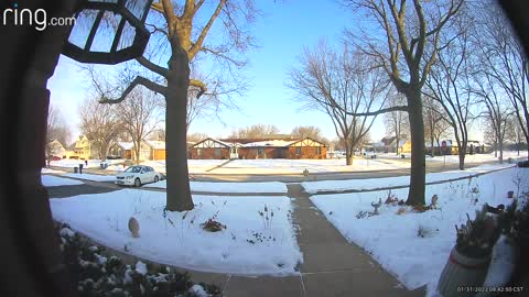 Sister Backing Out of Driveway Hits Garbage Cans