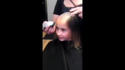 Teenage Girl Shaves her Head to Raise Money for St Baldrick's Foundation