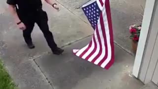 Washington State Cop Rolling Up American Flag