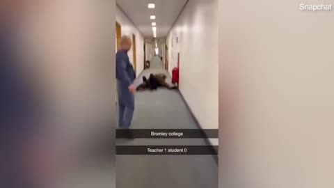 (Shocking Moment) Bromley college teacher and student crash to floor in fight
