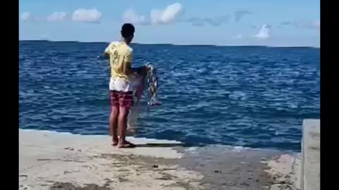 Cast net fishing