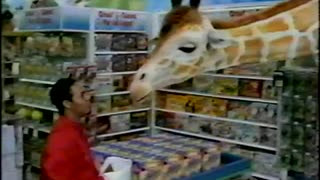 November 2002 - Toy Sale Makes Geoffrey the Giraffe Sad