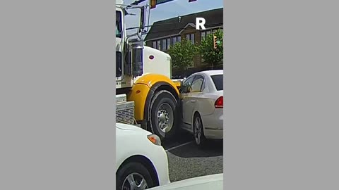 Dash cam Video of Semi truck crushing a car