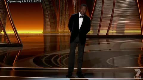 Watch the uncensored moment Will Smith smacks Chris Rock on stage at the Oscars, drops F-bomb