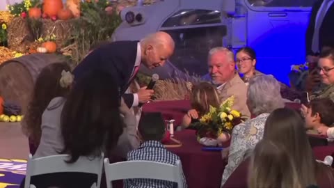 Biden notices a small girl in the crowd ...