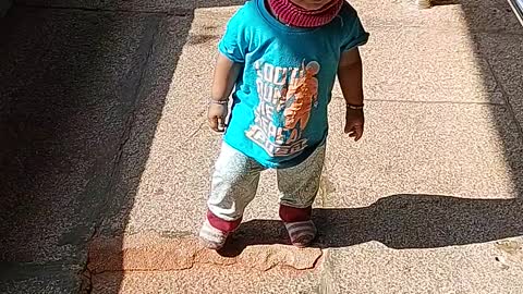 Baby boy stepping tirumala steps