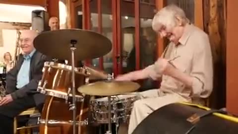 Slushy and Groovy: Gramps still drumming skills at old age.