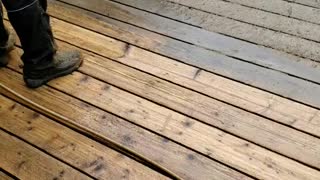 Power washing a deck