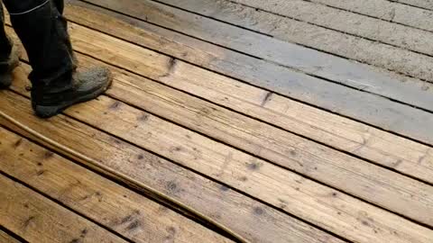 Power washing a deck